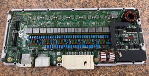 car amplifier opened showing circuit board