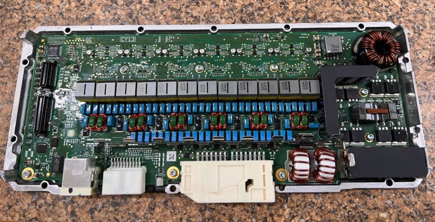 car amplifier opened showing circuit board